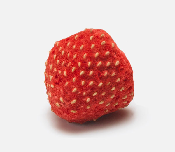 A single freeze-dried strawberry up close.
