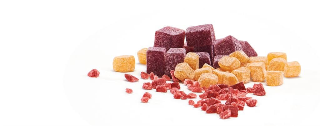 Fruit granules of various cut sizes and colors.