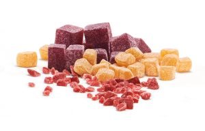 Fruit granules of various cut sizes and colors.