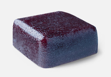 A single cube-shaped fruit gum.