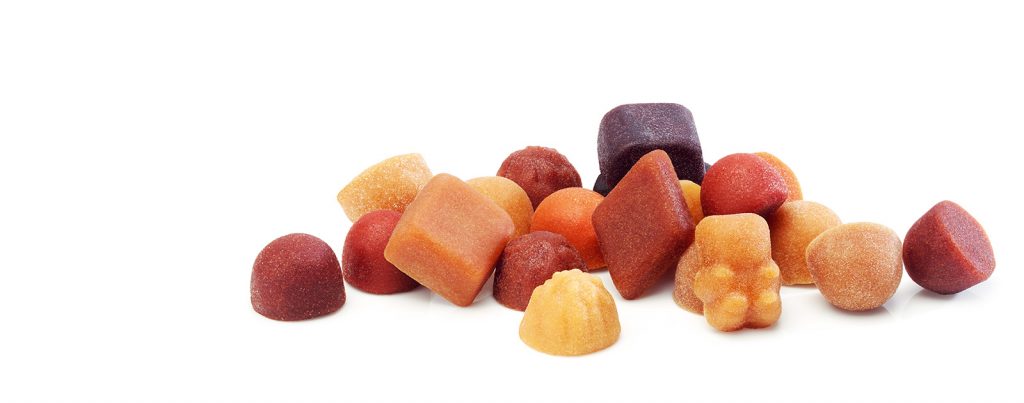 Chicles vitamínicos de frutas de diversas formas y colores.