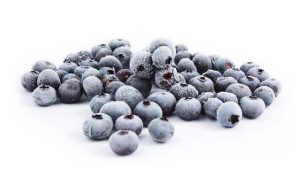A bunch of frozen blueberries.