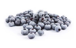 Paradise Fruits Blog A bunch of frozen blueberries.