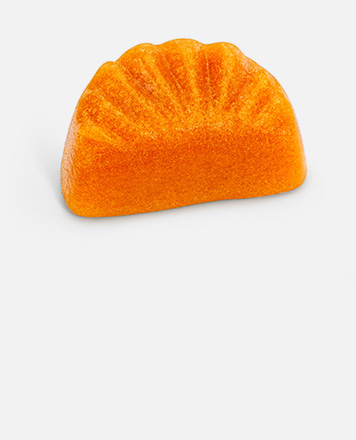 Un chicle de una sola fruta con forma de gajo de mandarina.