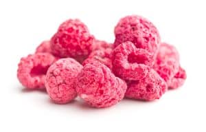 A bunch of freeze-dried raspberries up close.