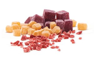 Fruit granules of various cut sizes and colors.