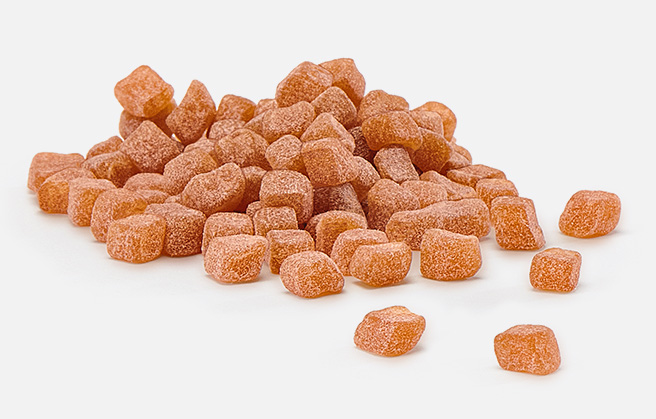 Orange colored fruit granule.