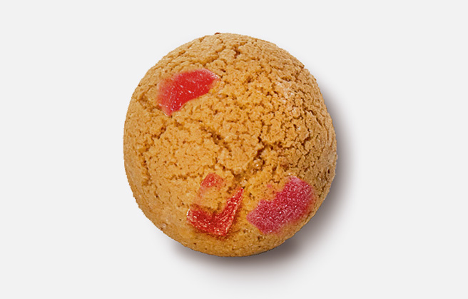 Cookie with red fruit mass inside.