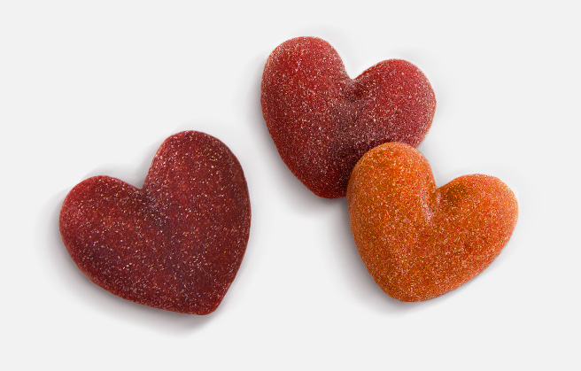 Three heart-shaped fruit gums.